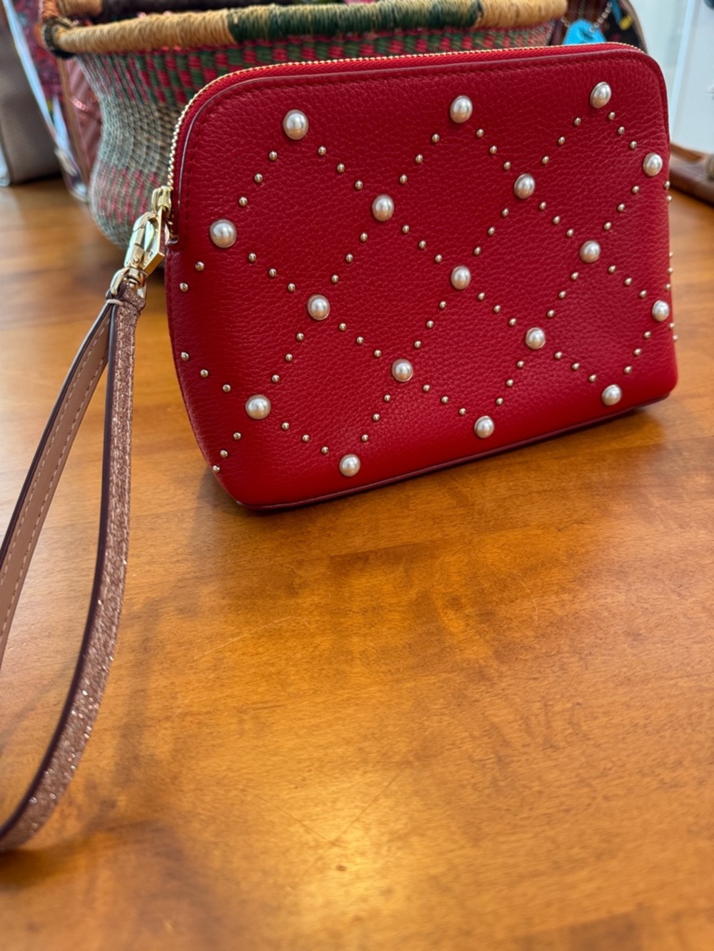 Kate Spade pearl-studded wristlet